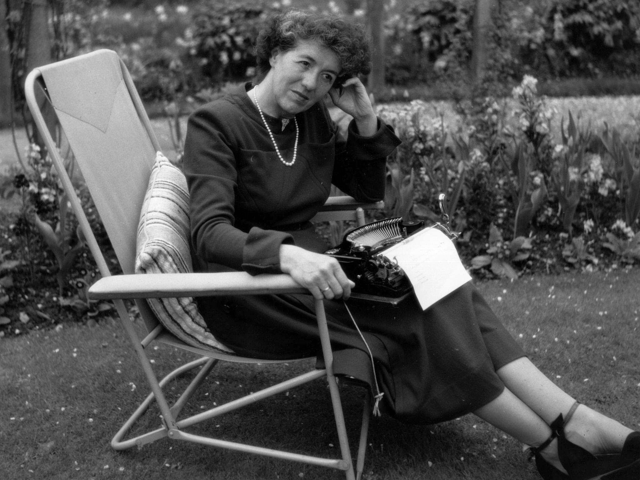 Children's writer Enid Blyton sitting in her garden in Beaconsfield, Buckinghamshire, in 1949