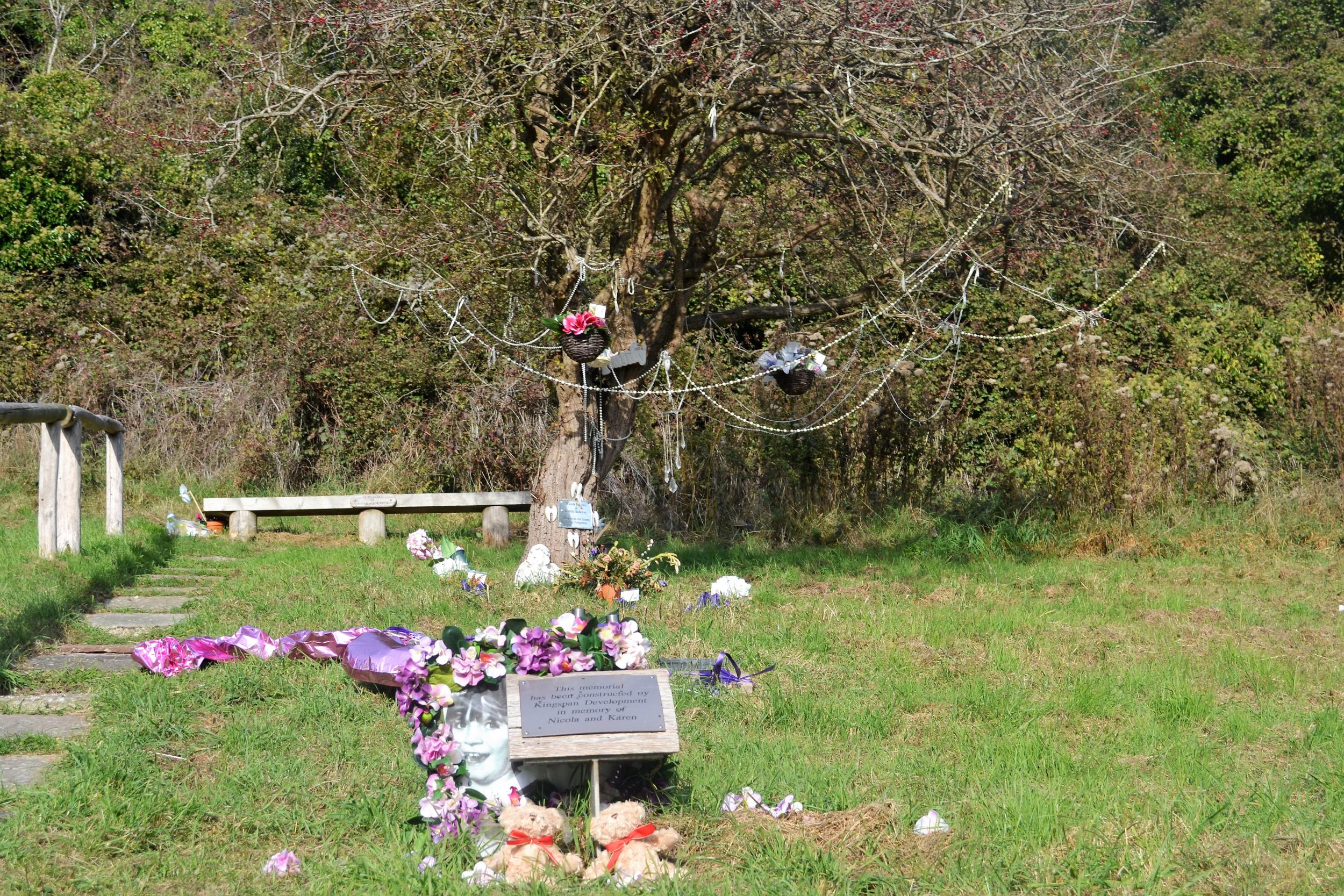 The memorial to Karen Hadaway and Nicola Fellows stands in Brighton’s Wild Park at the tree where they were seen playing shortly before they disappeared