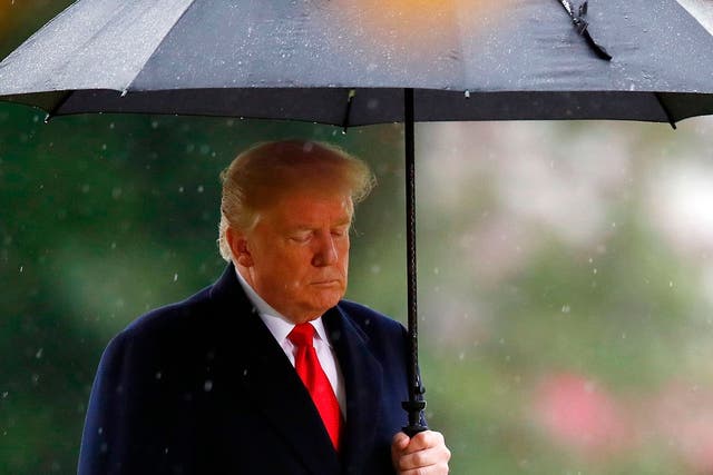 US President Donald Trump  visits the American Cemetery of Suresnes after missing a scheduled visit to another US cemetery because of the rain