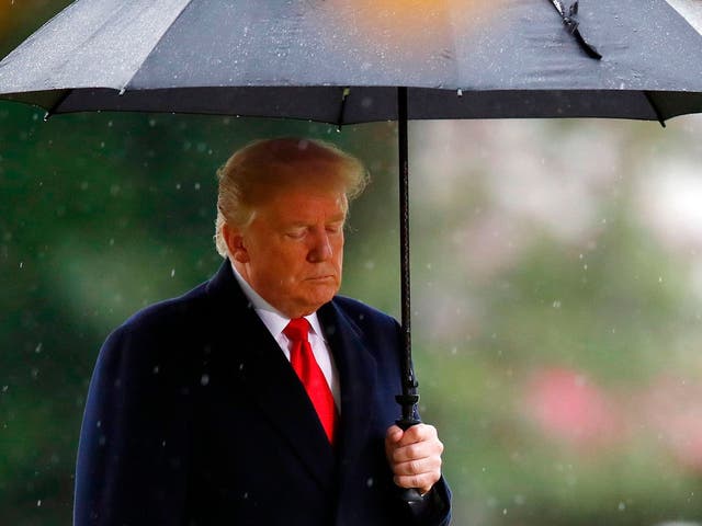 US President Donald Trump  visits the American Cemetery of Suresnes after missing a scheduled visit to another US cemetery because of the rain