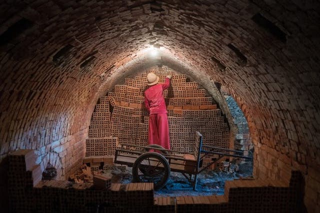 Almost every brick laid in the nation’s urban expansion is fired in kilns where workers languish for years in bondage