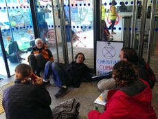Climate protesters chain themselves together at energy department HQ