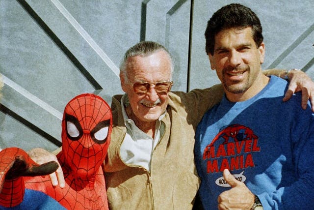 Marvel Comic Books founder Stan Lee (C) poses with one of his characters "Spider-Man" (L) and actor Lou Ferrigno who portrayed "The Incredible Hulk" on television