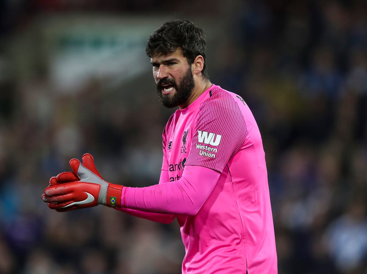 Liverpool news: Alisson admits he feels pressure that comes with being ...