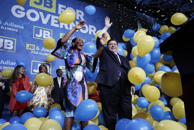 Democratic governor candidate J.B. Pritzker, right, and his running mate Juliana Stratton celebrate after beating Republican incumbent Bruce Rauner in Chicago