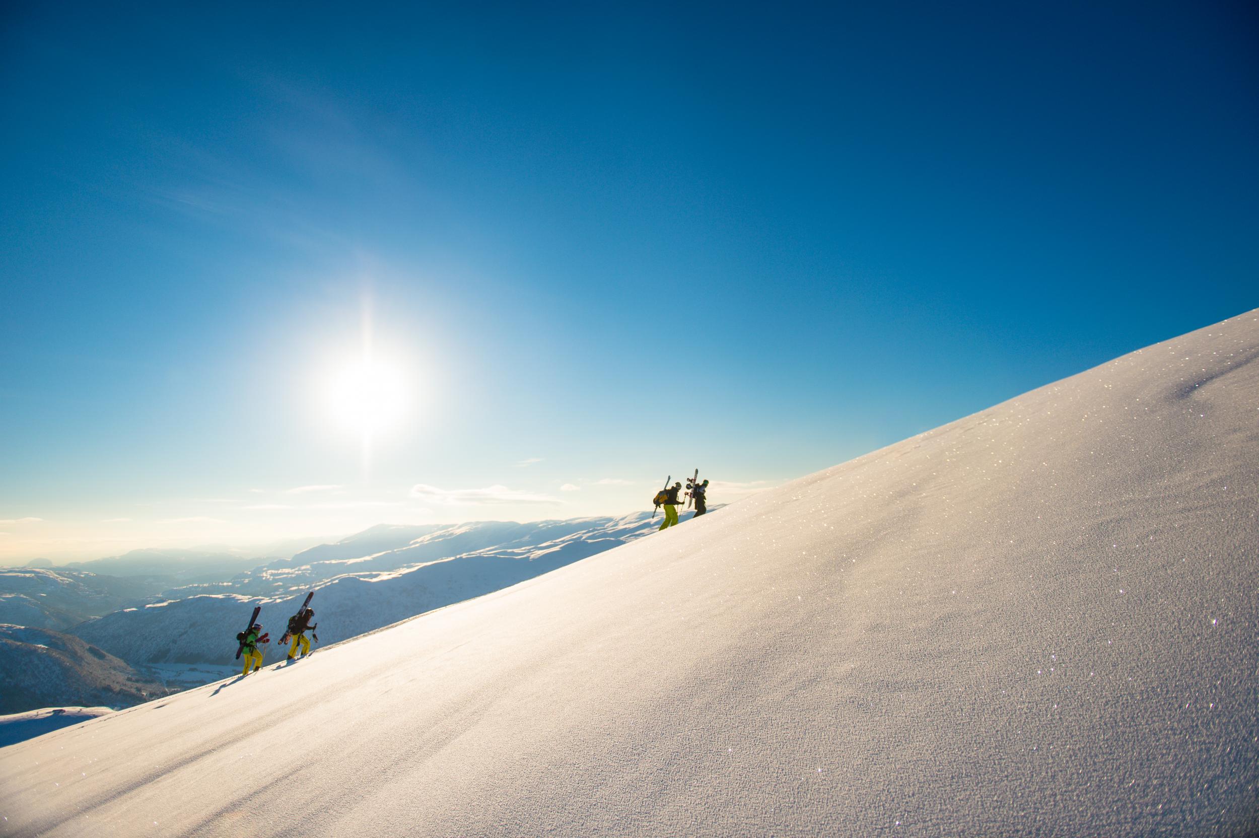 Premium Photo  Skier sliding down the mountain on the snow in the ski  resort