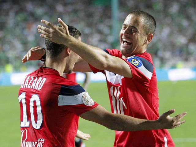 Lille's Eden Hazard celebrates with teammate Joe Cole