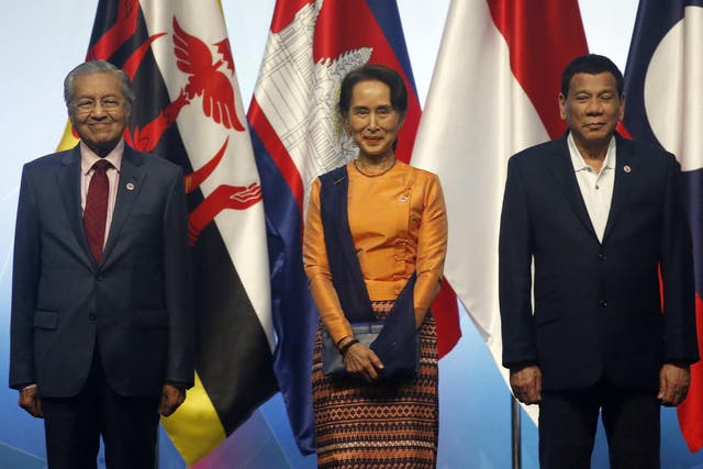 From left: Malaysian PM Mahathir Mohamad, Myanmar leader Aung San Suu Kyi and Philippine President Rodrigo Duterte at the opening ceremony of the 33rd ASEAN Summit and Related Summits in Singapore on Tuesday 13 November 2018. (Bullit Marquez/