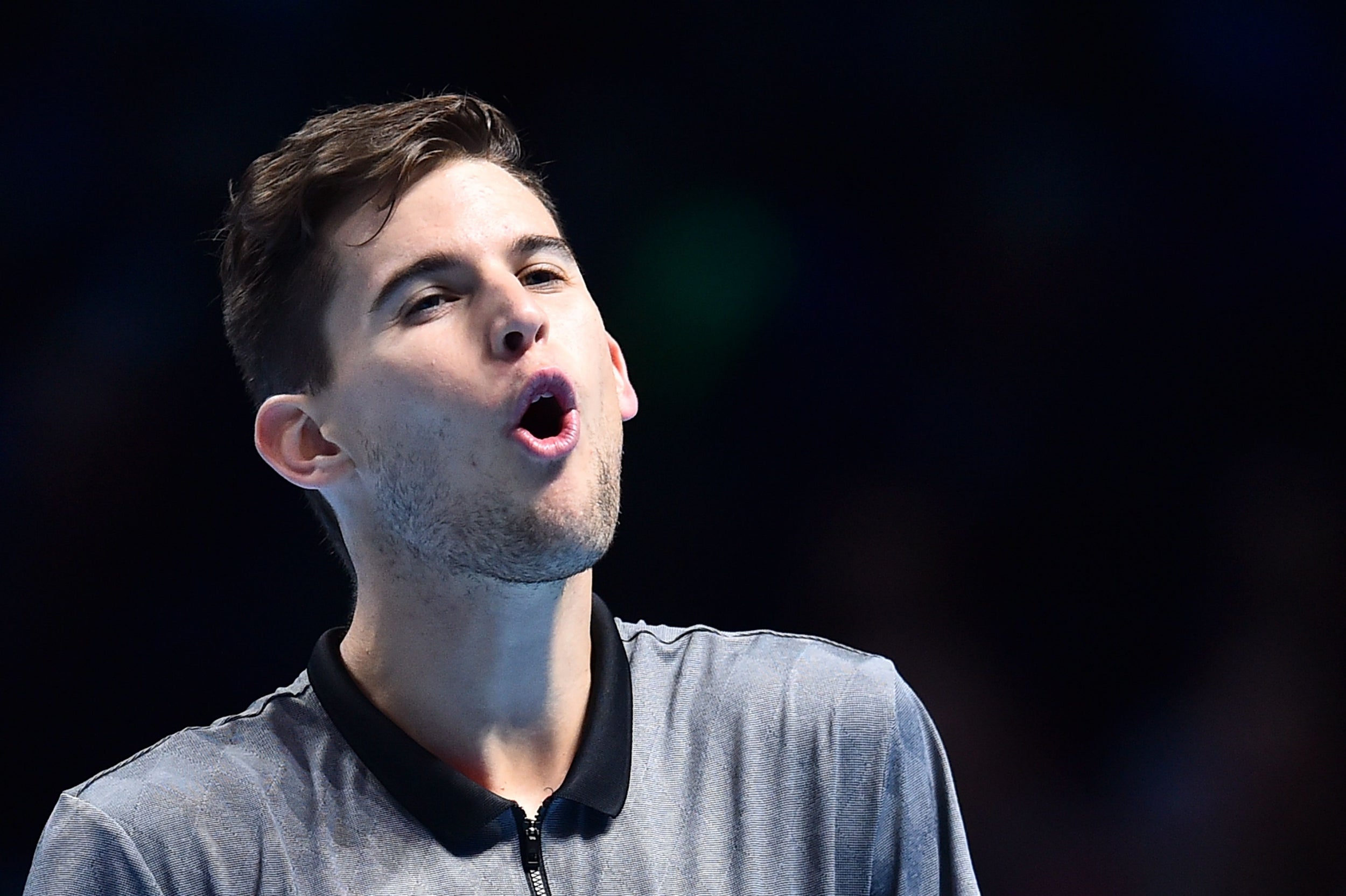 Dominic Thiem reacts to a lost point against Federer (AFP/Getty)
