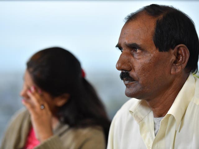 Ashiq Mesih (R) and Eisham Ashiq, the husband and daughter of Asia Bibi, speak during an interview with AFP in London on 12 October 2018 (BEN STANSALL /