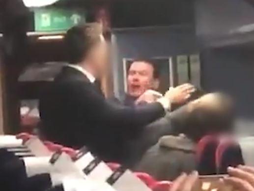 A man was filmed hurling racist abuse at an Asian couple aboard a train in Bristol.