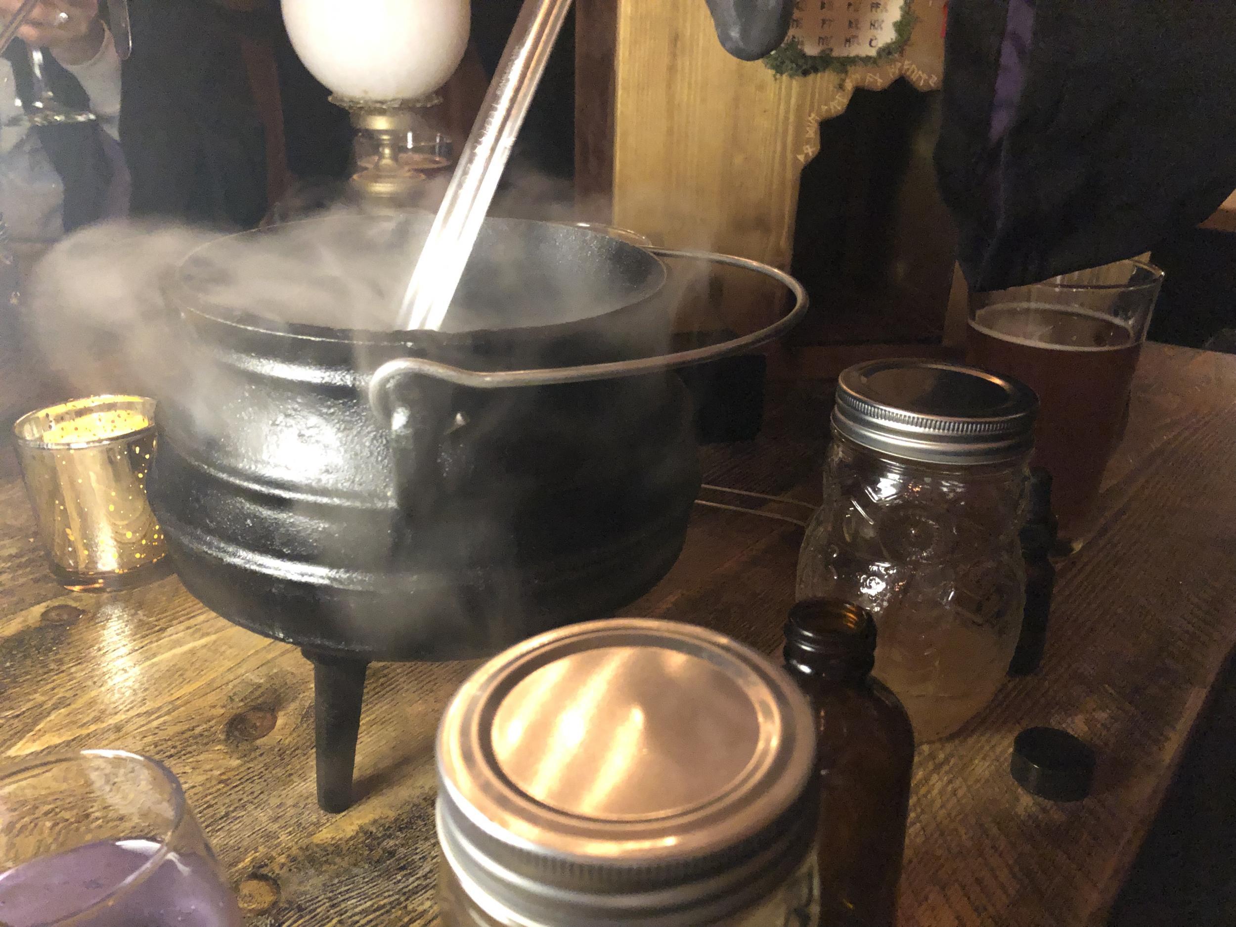 Cauldrons fill with smoke as you make your drinks