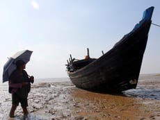 Myanmar detains over 100 Rohingya refugees in boat off coast