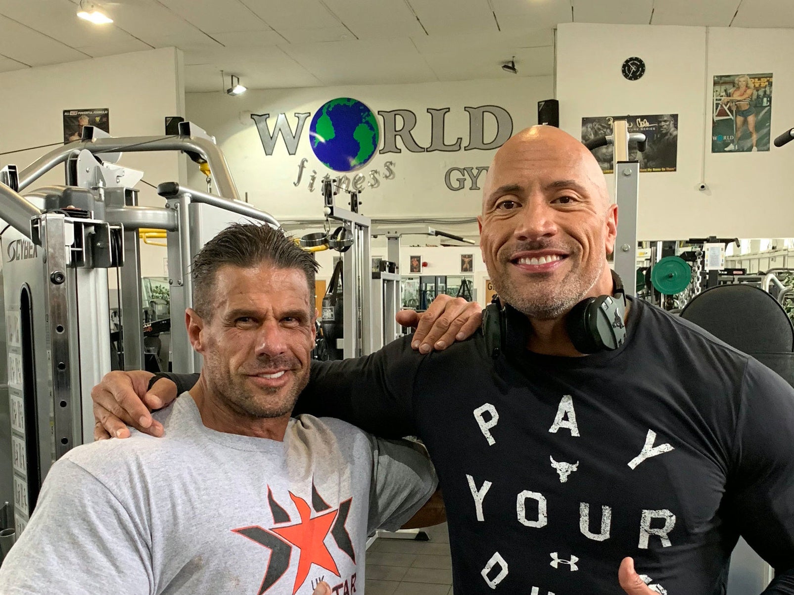Dwayne 'The Rock' Johnson posing with Craie Carrera, owner of World Fitness Gym in Doncaster
