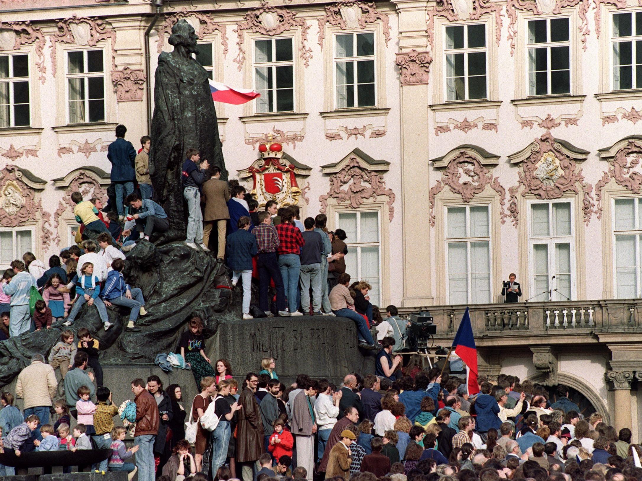 Vaclav Havel addresses supporters from the balcony of the Kinsky Palace at the Old City Square on 23 February 1990 in the wake of his victory