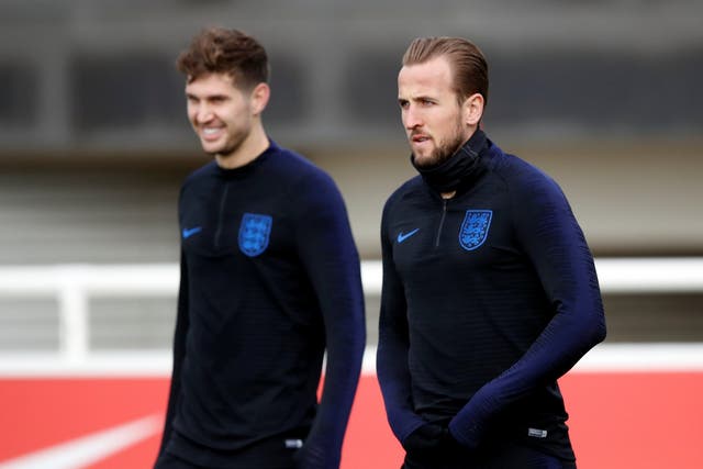 Harry Kane, right, and John Stones will return to the first XI
