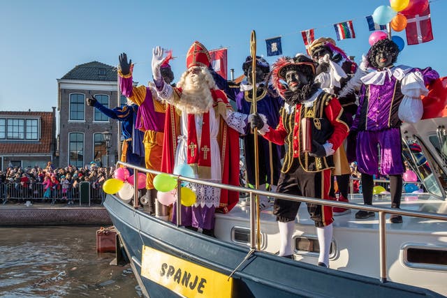  A shrinking majority of Dutch people say there is no reason to change a holiday tradition (pictured) they consider to be harmless fun.