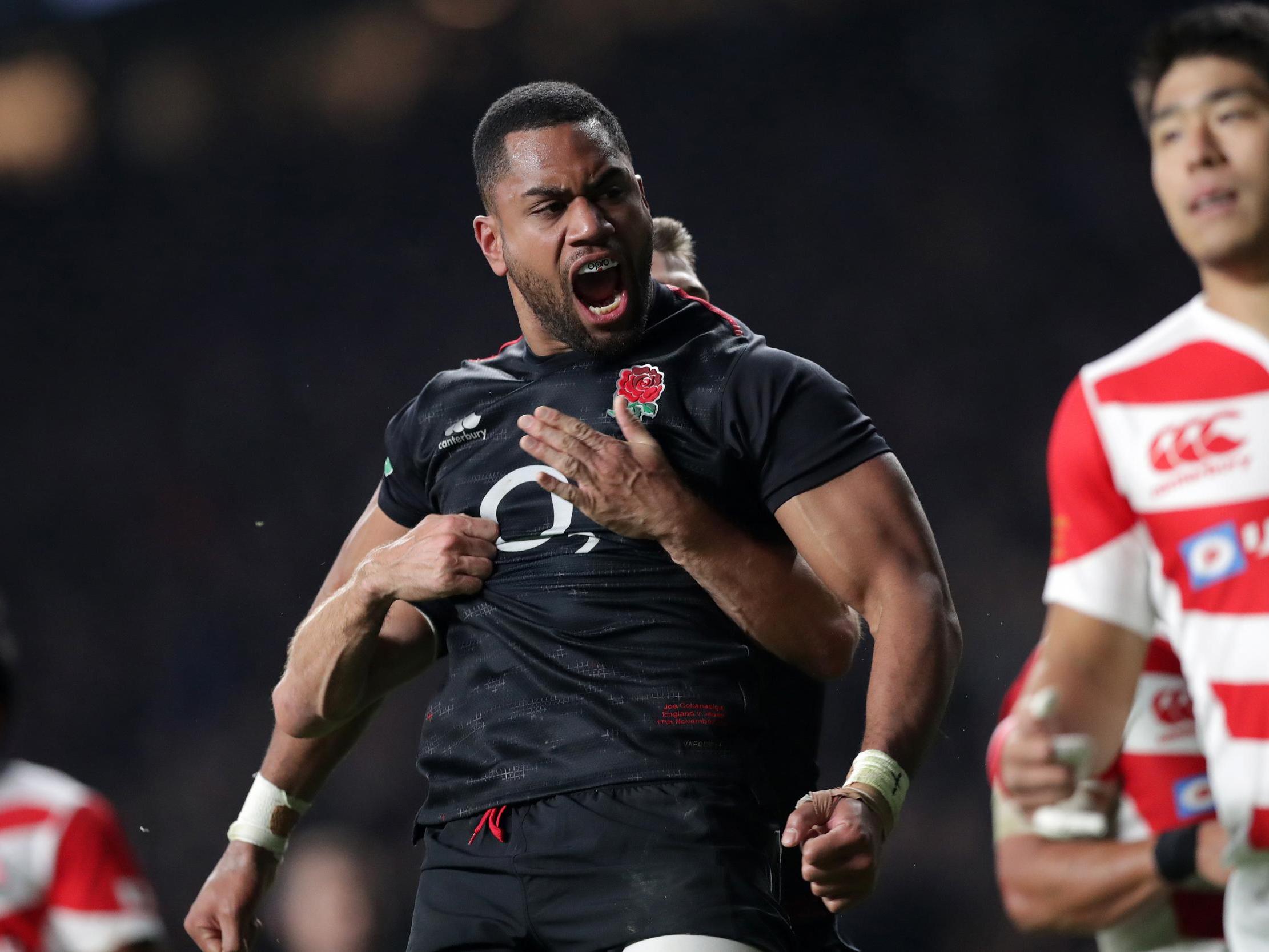 Joe Cokanasiga celebrates scoring his first try for England on his debut