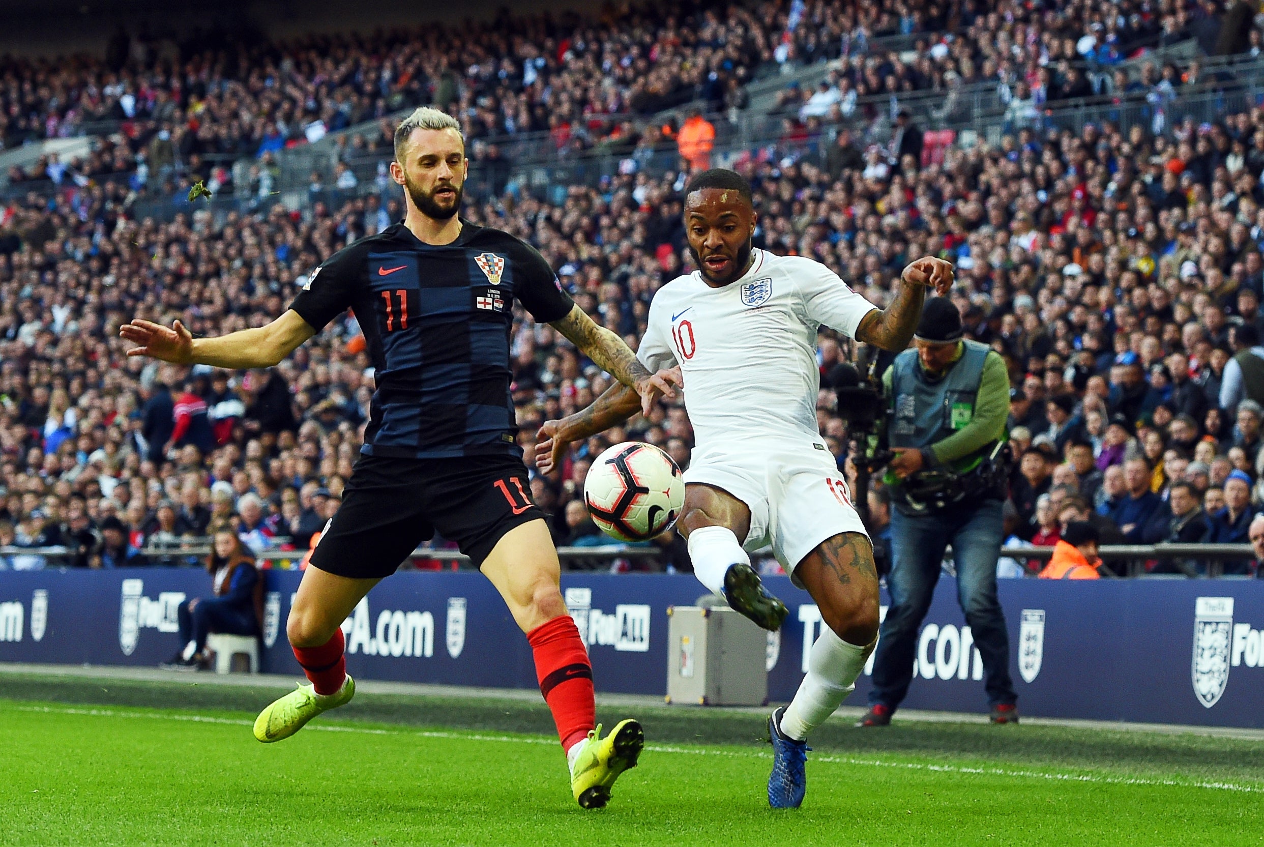 Raheem Sterling gets on the ball for England