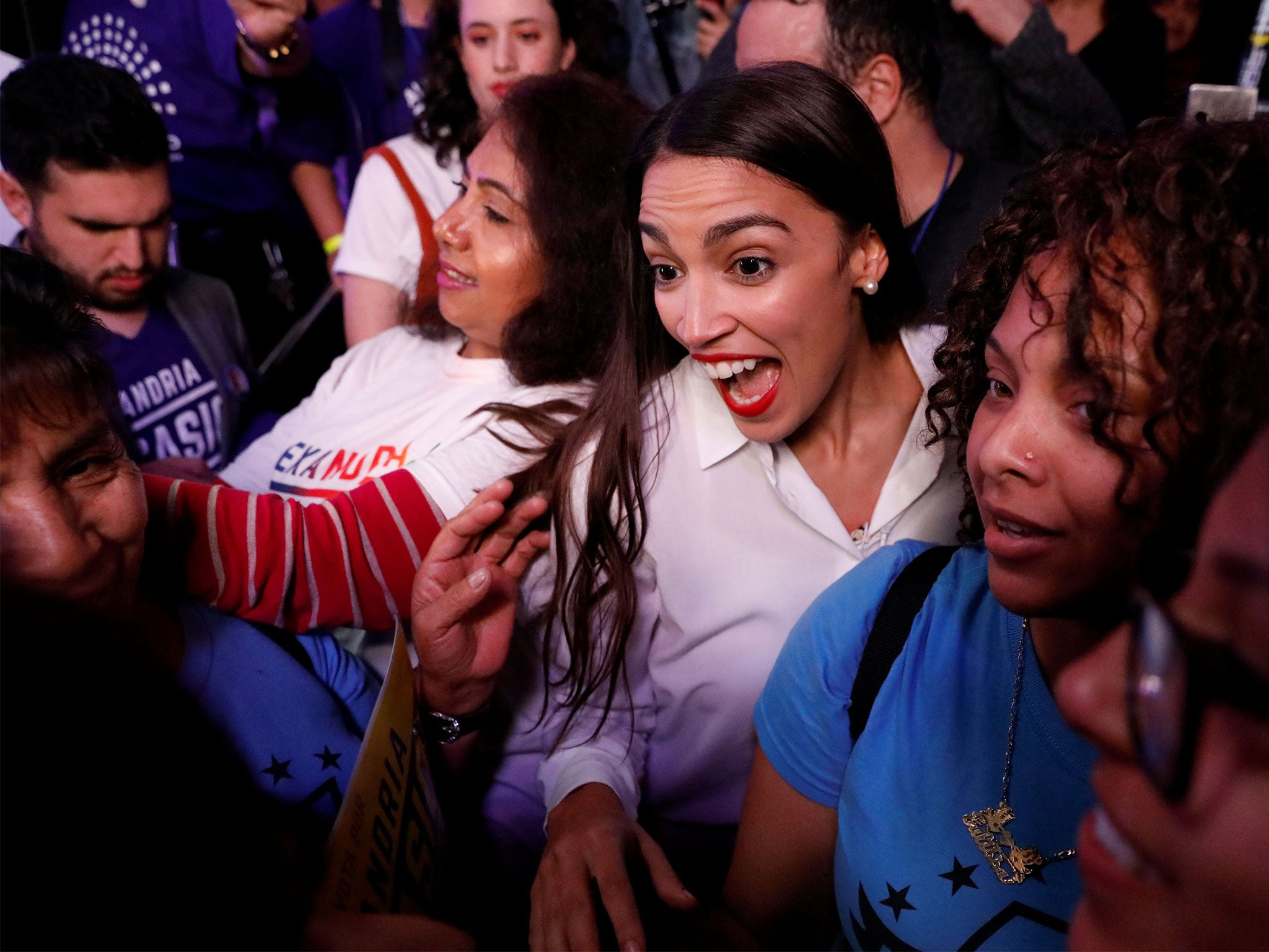 Alexandria Ocasio-Cortez, centre right, was one of the winners in the blue surge and will take her seat in congress in January