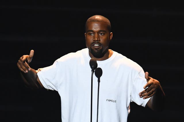 In this file photo taken on August 28, 2016, musician Kanye West performs on stage during the 2016 MTV Video Music Awards at Madison Square Garden