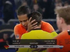 Van Dijk consoles grieving referee after Netherlands draw with Germany