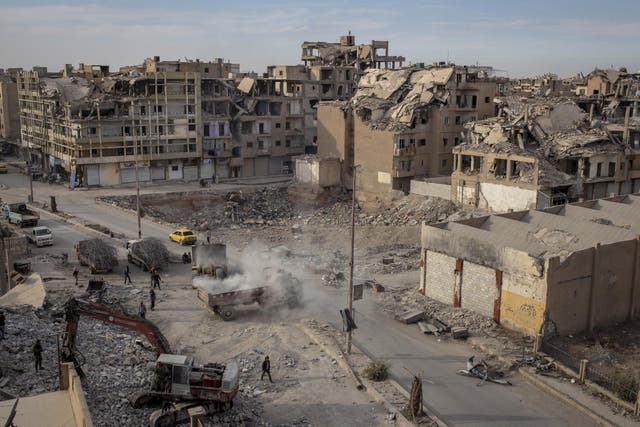 Destroyed buildings and reconstruction in Raqqa.