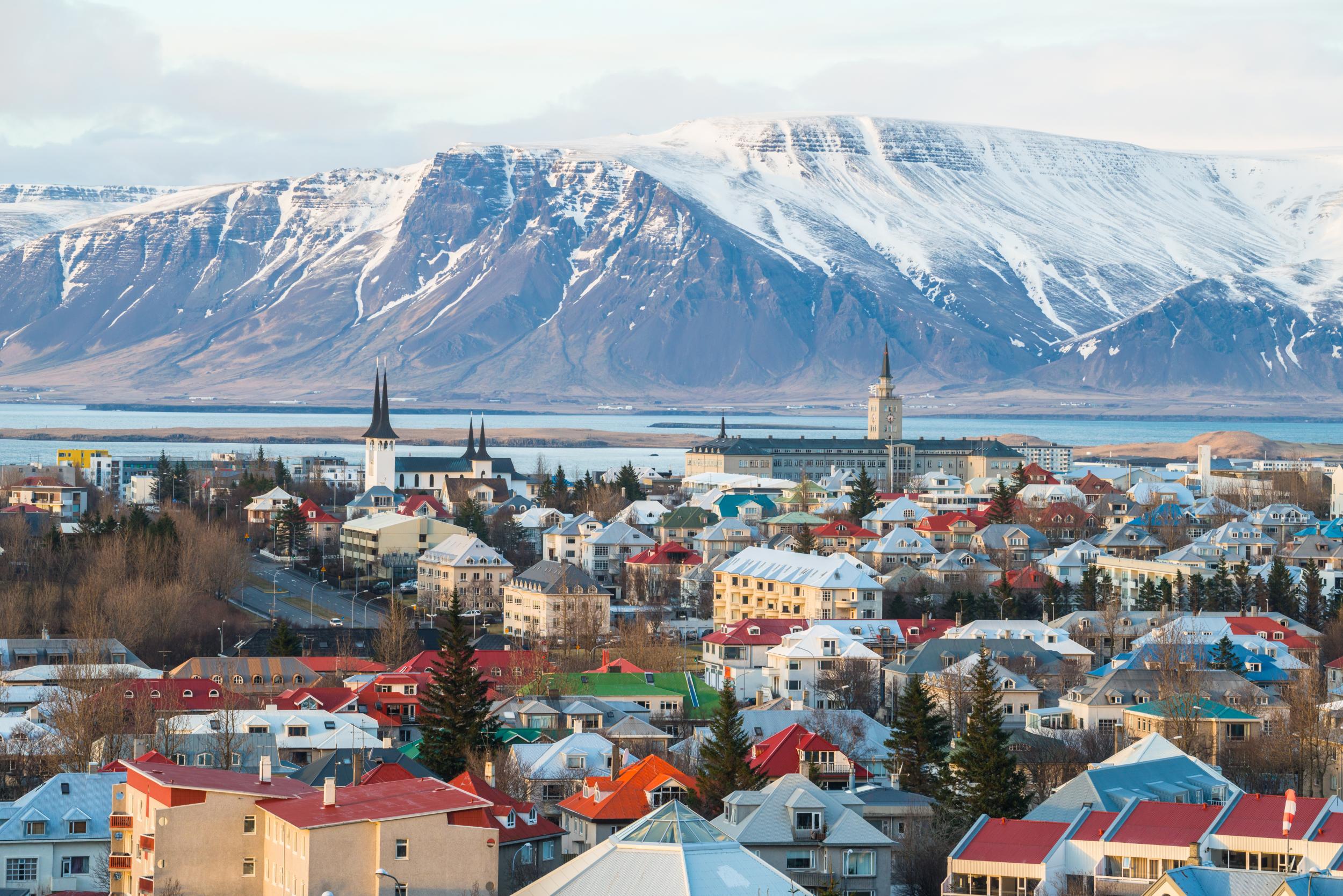 Hike between tectonic plates, bathe in natural steaming hot springs and walk on glaciers