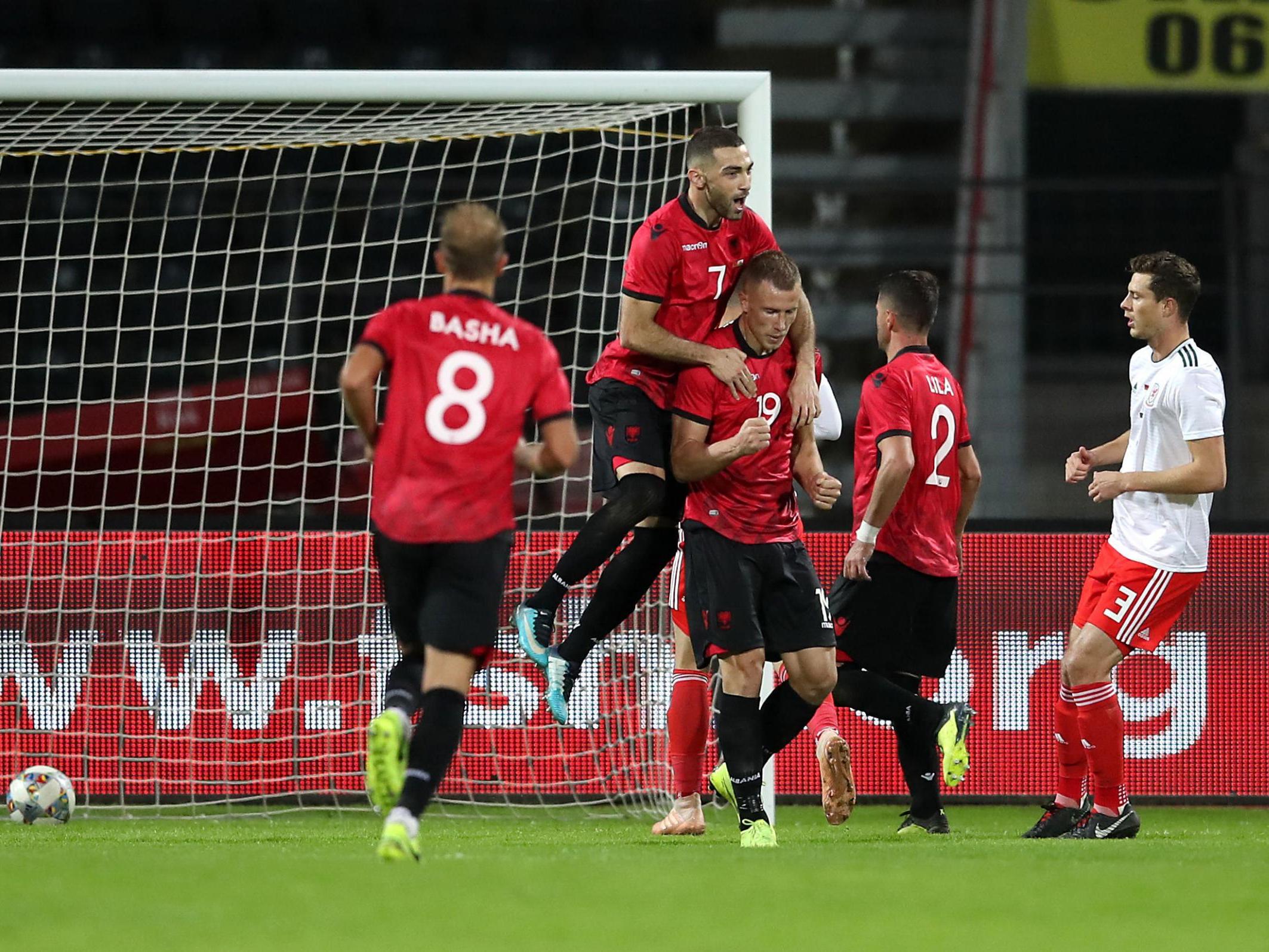 Bekim Balaj celebrates scoring the winning goal for Albania against Wales