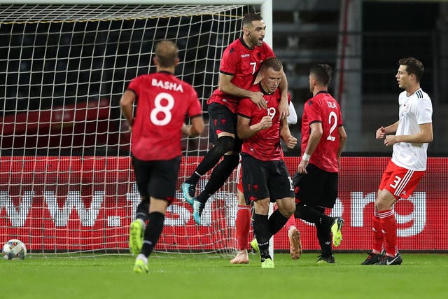 Bekim Balaj celebrates scoring the winning goal for Albania against Wales
