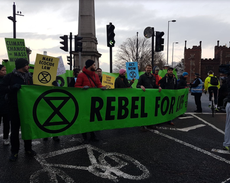 Climate change protesters 'swarm' London bridges at rush hour