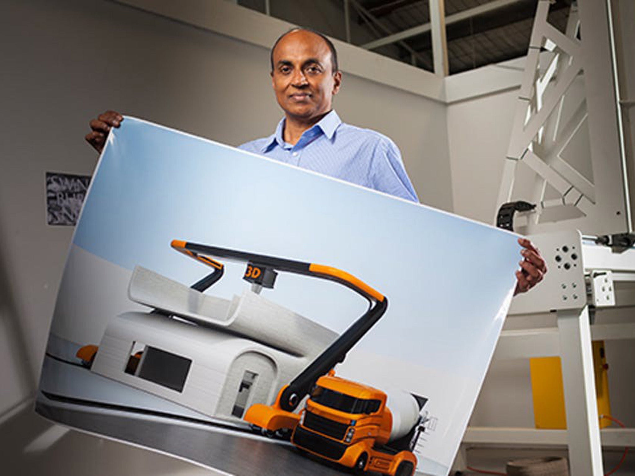 Jay Sanjayan with a 3D-printed concrete building design