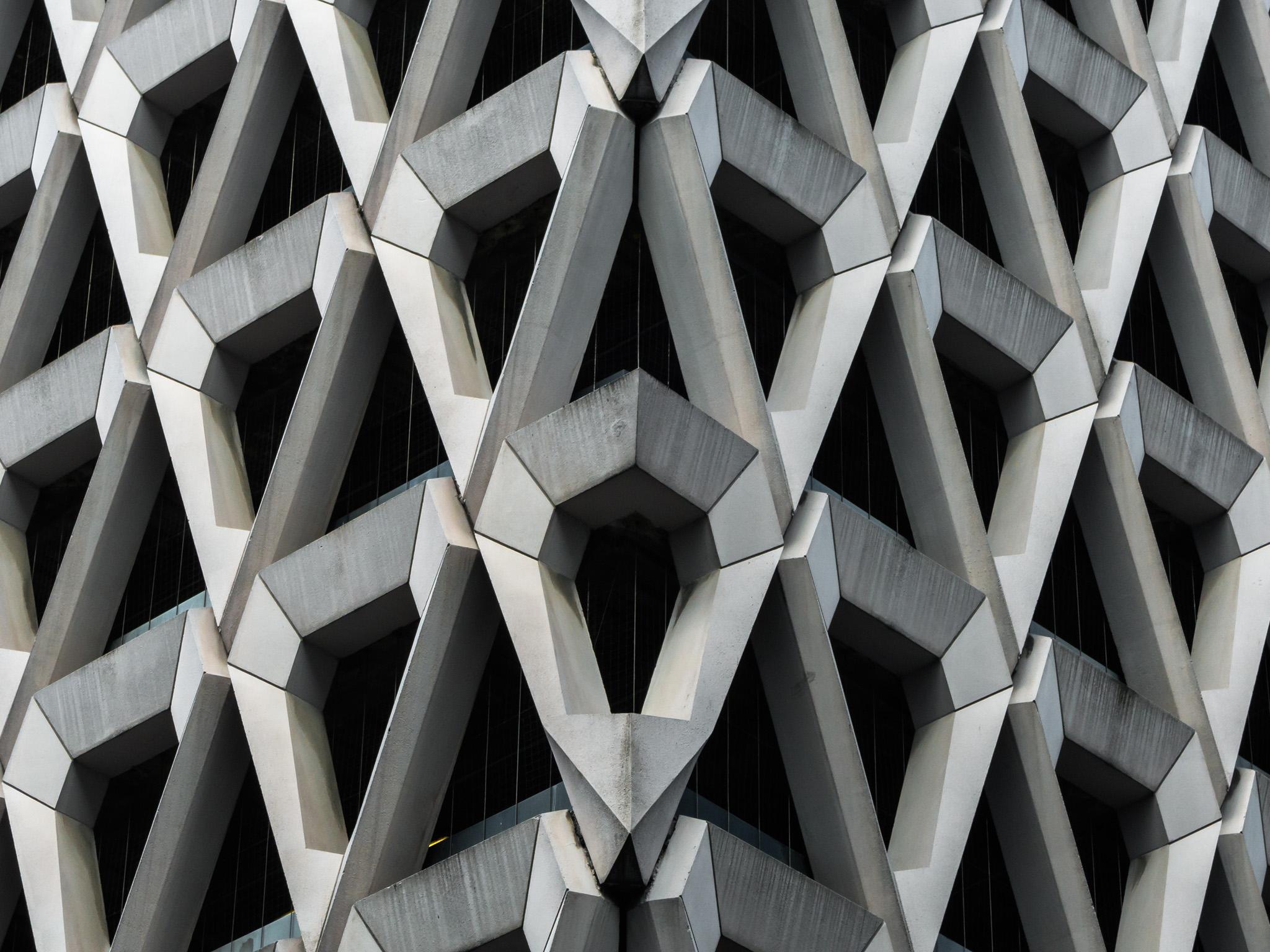 The brutalist concrete diamond-shaped facade of the car park in Welbeck Street, Marylebone, London