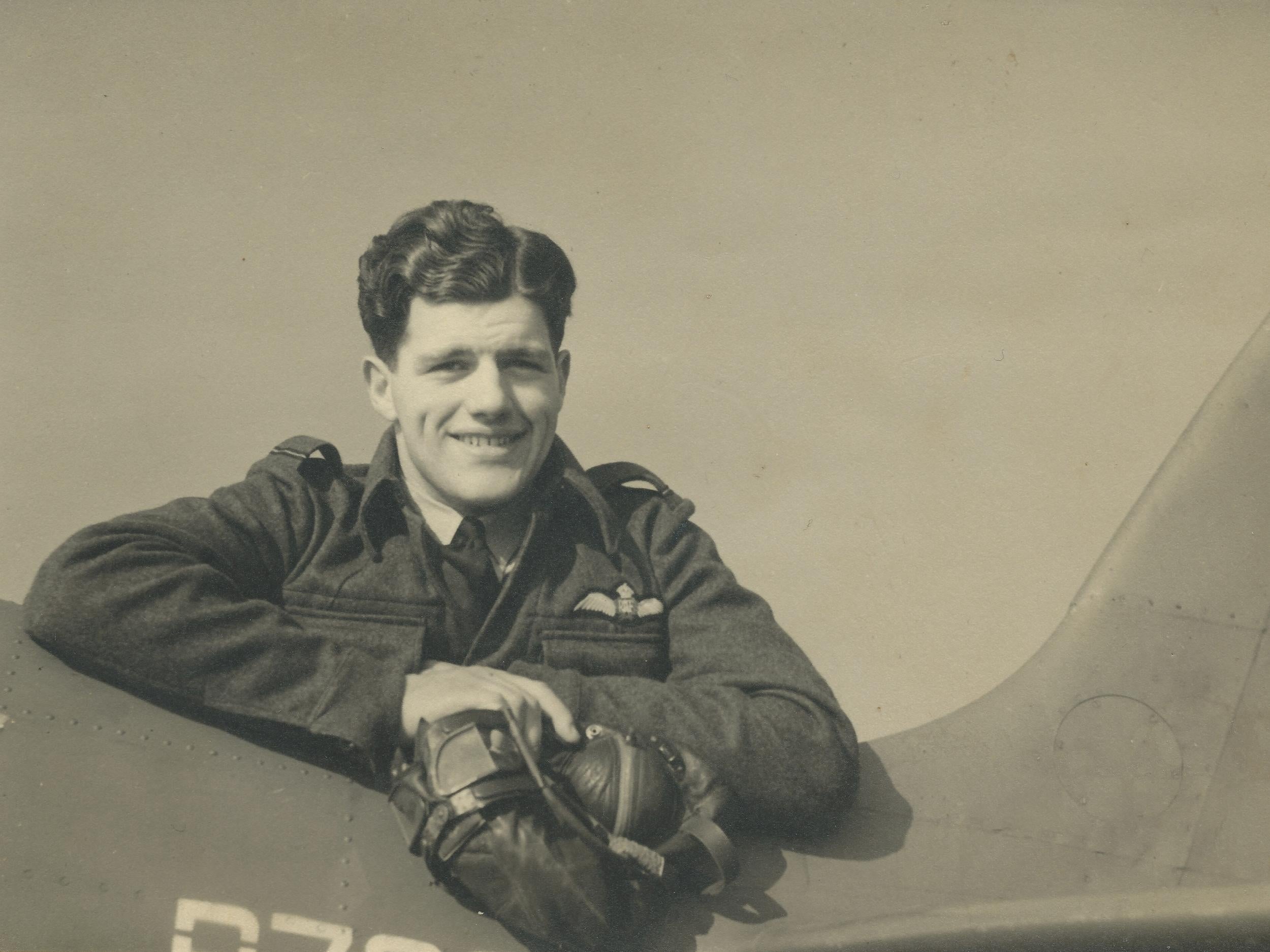 Alastair Gunn on the tail of Spitfire R7056 at RAF Benson