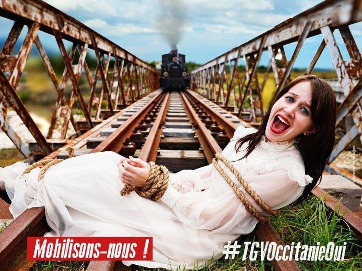 Bezeers Mom Videos - Poster depicting screaming woman tied to train tracks was not illegal,  rules French court | The Independent | The Independent