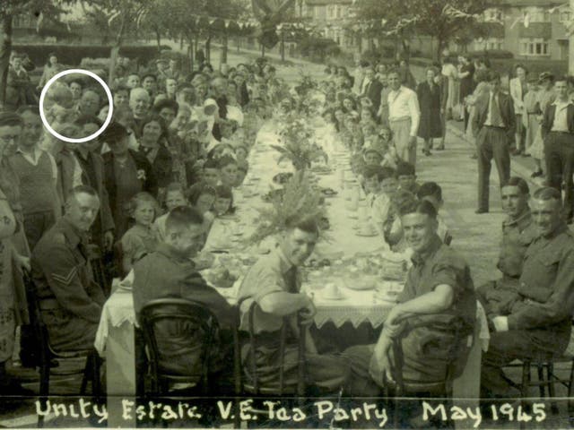 Nan holding my father (top left) at a Unity Estate VE tea party in 1945