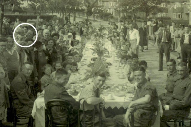 Nan holding my father (top left) at a Unity Estate VE tea party in 1945