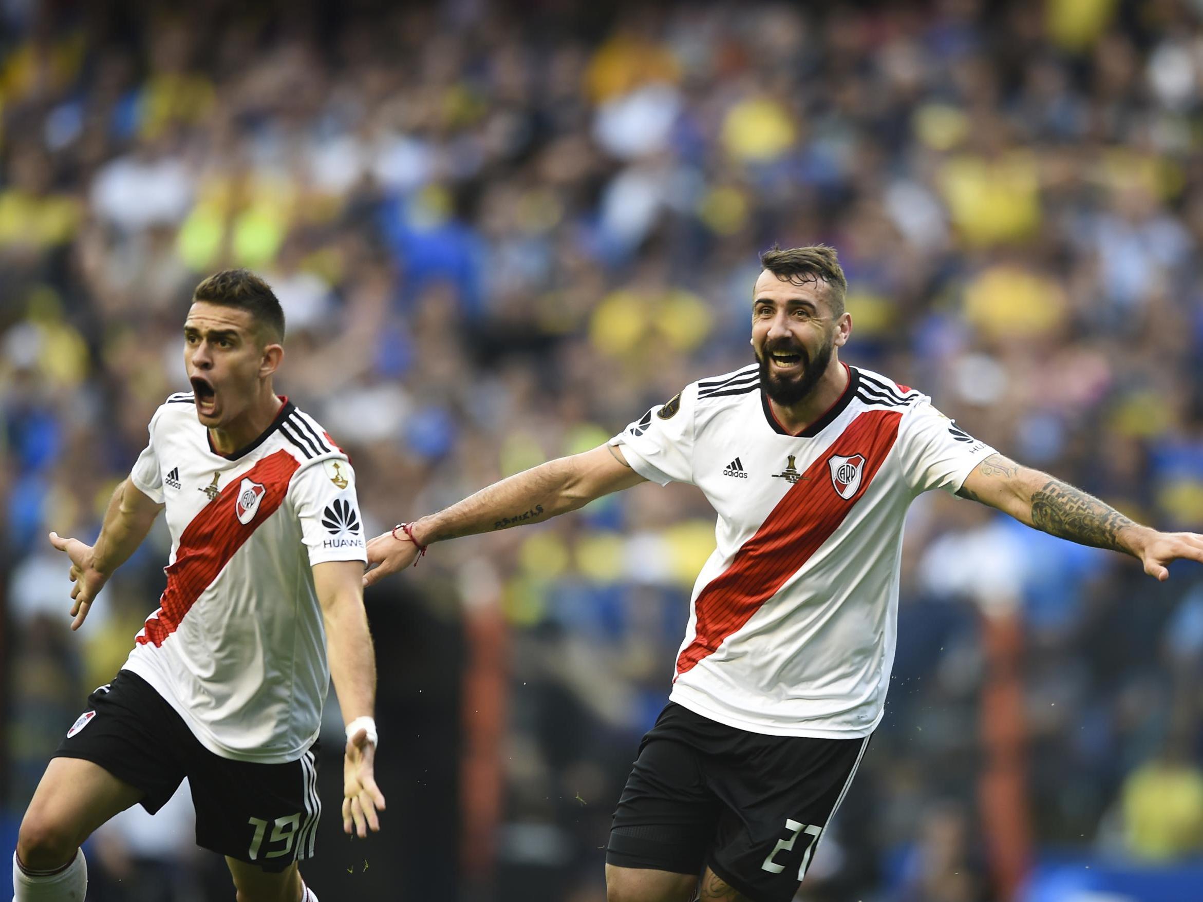 Lucas Pratto celebrates after scoring for River in the first leg