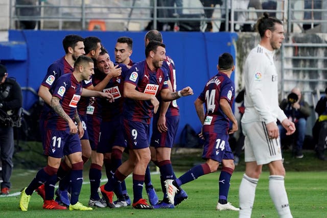 Eibar's Gonzalo Escalante celebrates scoring their first goal with teammates