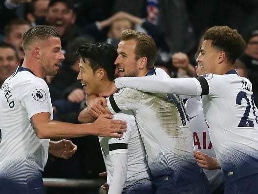 Tottenham celebrate their third