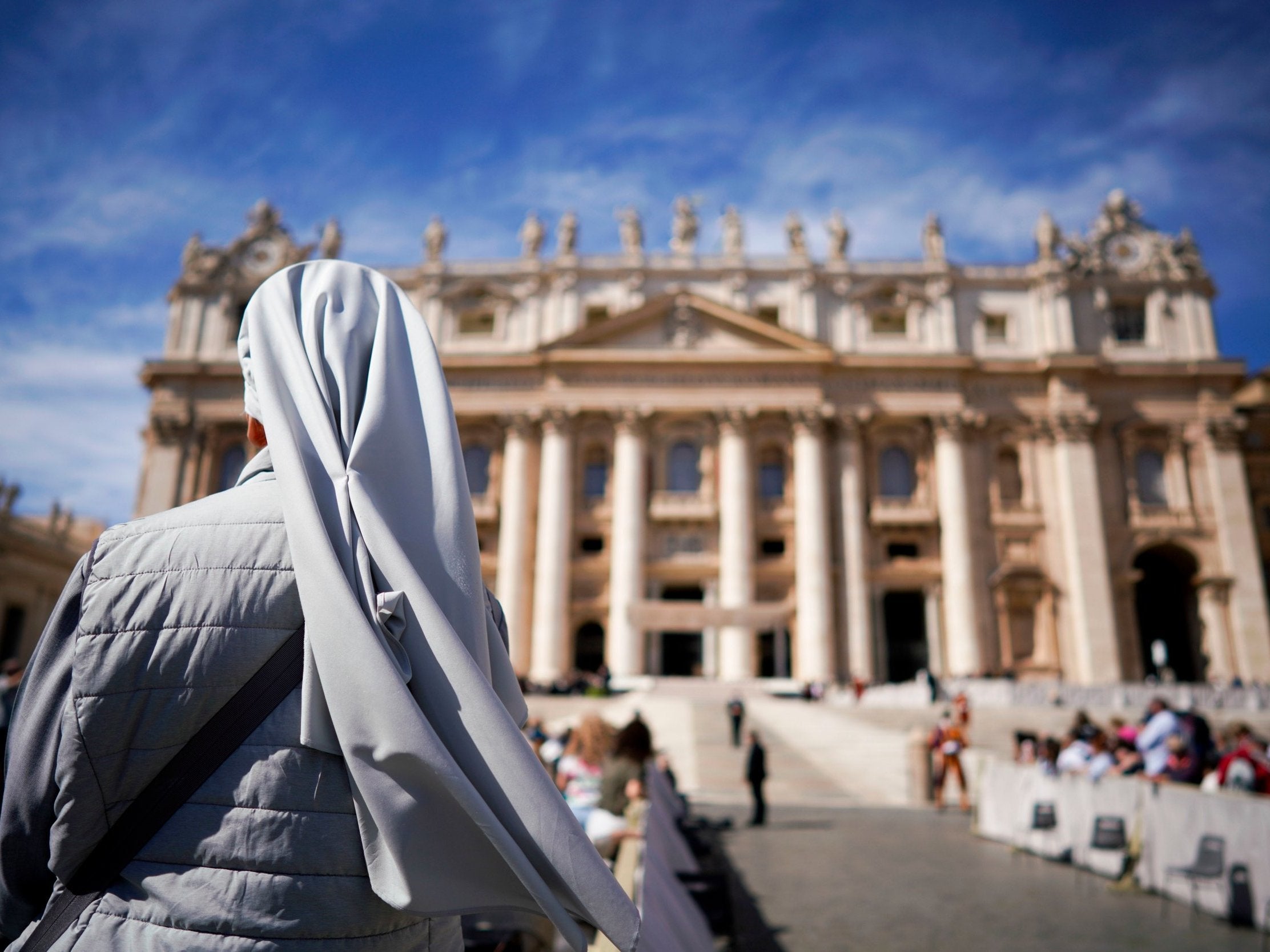 A nun waits for the arrival of Pope Francis for his weekly general audience, in St Peter's Square at the Vatican