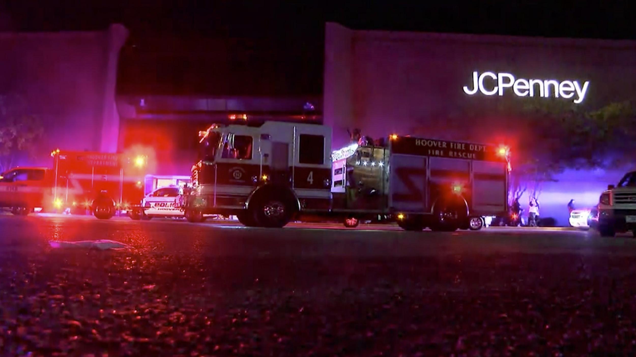 First responders outside the mall after the shooting. Photo via AP