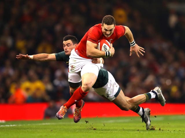 George North powers down the wing for Wales
