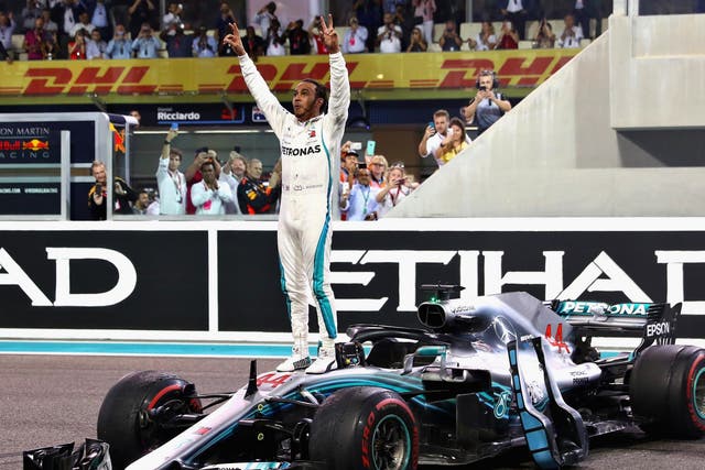 The world champion celebrates his final victory of the year