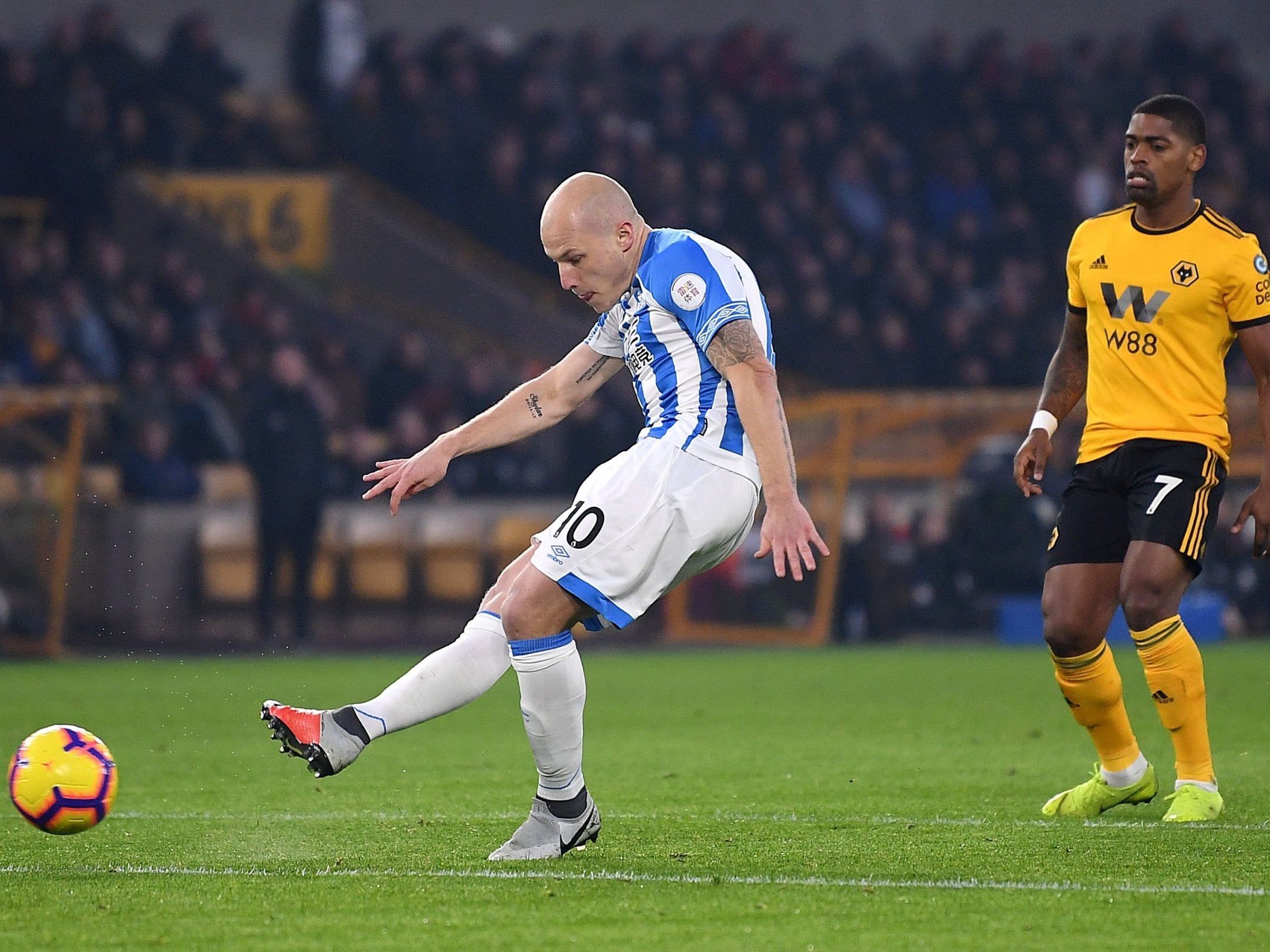 Aaron Mooy fires Huddersfield in front
