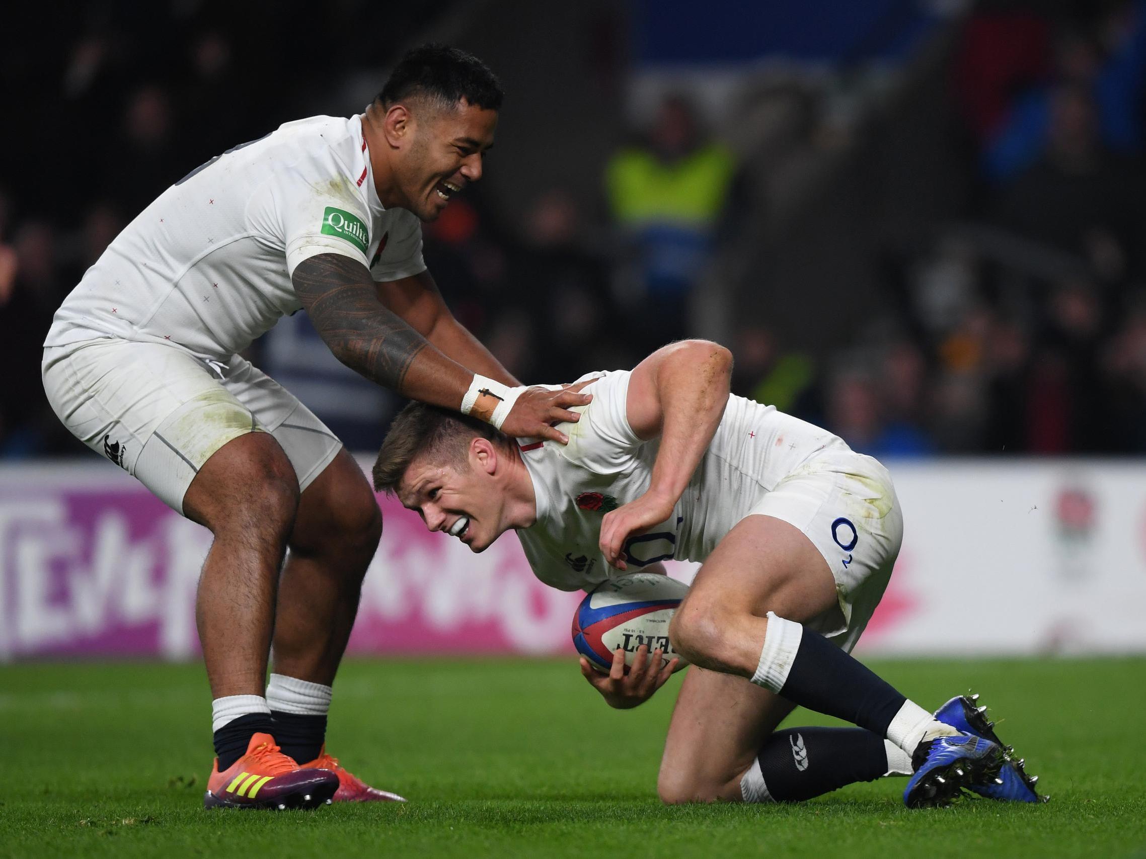 Tuilagi celebrates with Owen Farrell after scoring England's fourth try