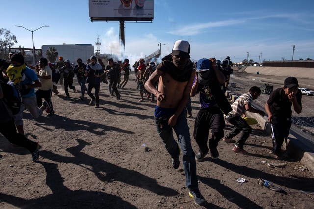 US border patrol agents used pepper spray and tear gas to stop hundreds of Central American migrants crossing from Tijuana, Mexico, into San Ysidro, California.