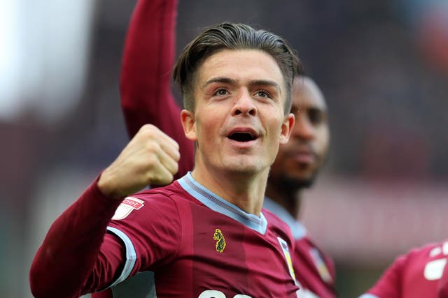Jack Grealish celebrates after scoring against Birmingham in the second-city derby