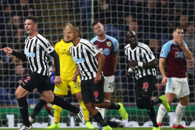 Ciaran Clark, right, celebrates scoring Newcastle's second goal