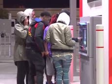Cash machine begins spitting out free money, sparking fight